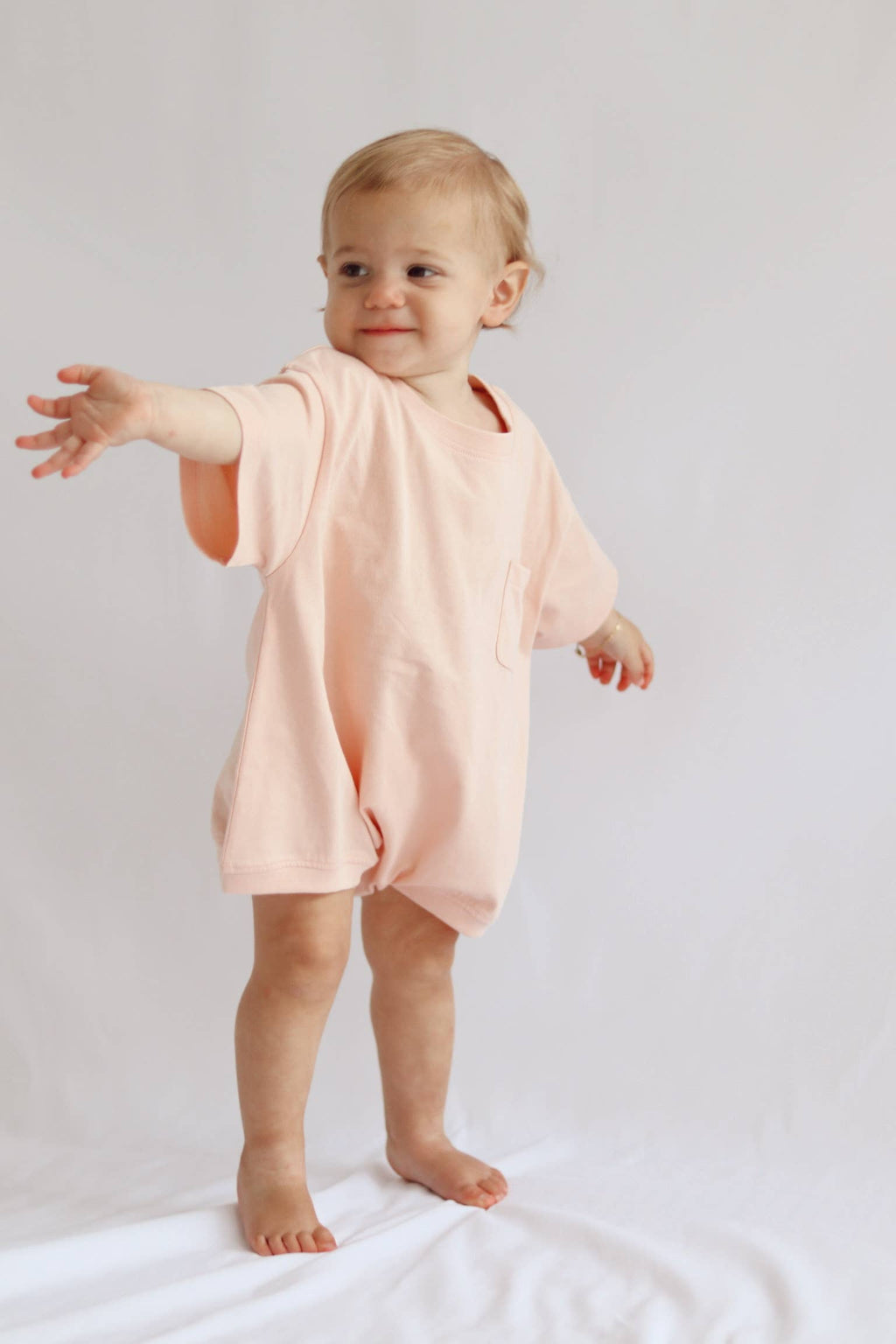 Pocket Romper in Peach Powder