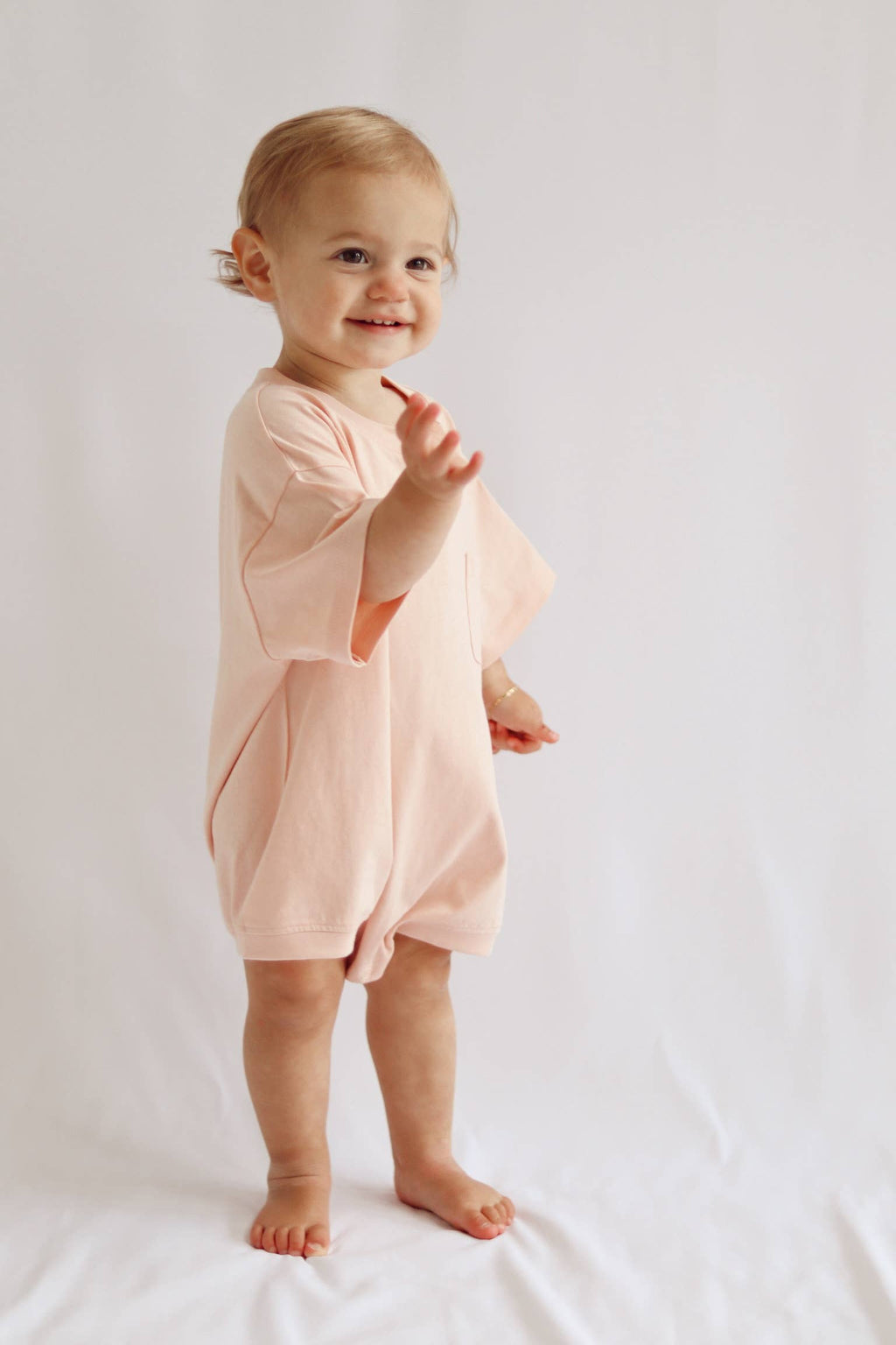 Pocket Romper in Peach Powder
